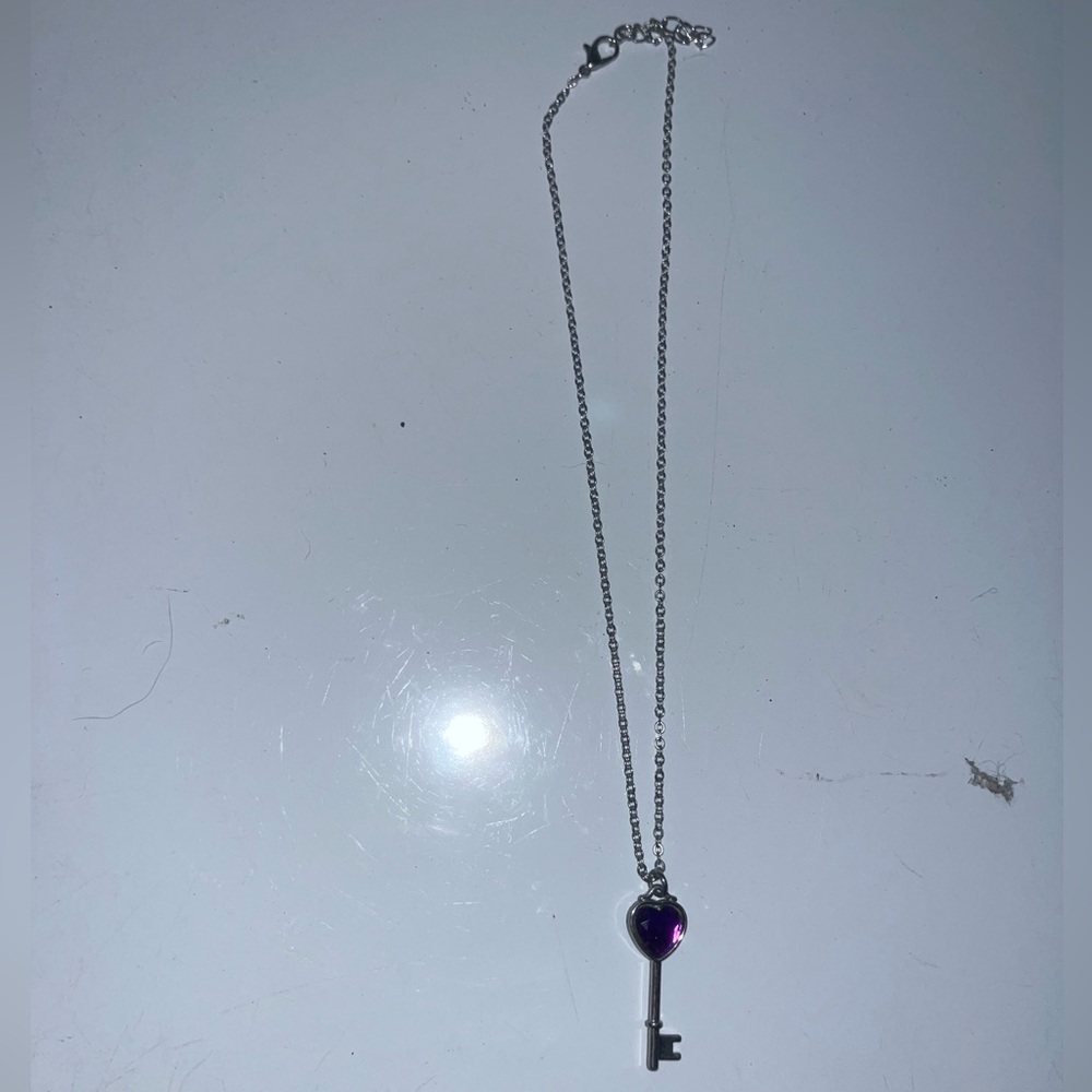 Silver Key Pendant Necklace with Purple Gem
